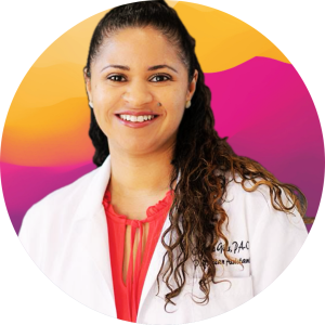 A person in a white lab coat smiles against a colorful gradient background.