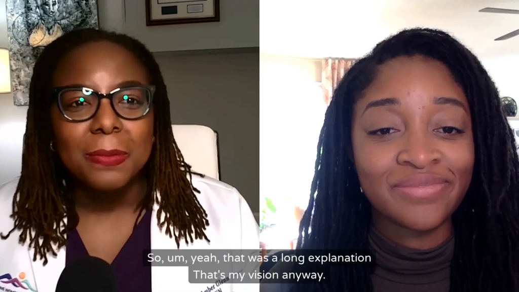 Two people with glasses and long braids are speaking in a video call. Subtitles at the bottom read: "So, um, yeah, that was a long explanation. That's my vision anyway.